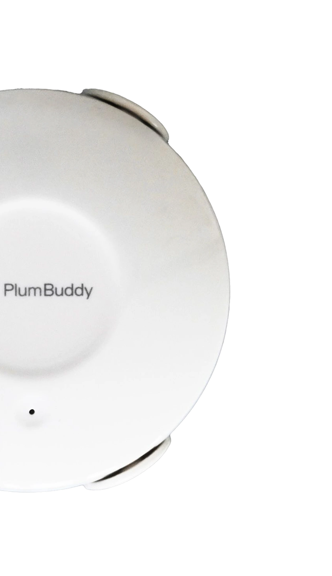 A PlumAssist leak detection sensor, seen from above